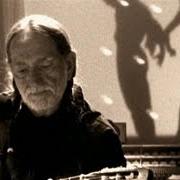 The lyrics DARKNESS ON THE FACE OF THE EARTH of WILLIE NELSON is also present in the album Teatro (1998)